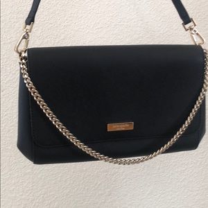 Kate spade crossbody. About 11” L, 6” H, and 1 1/2” W.